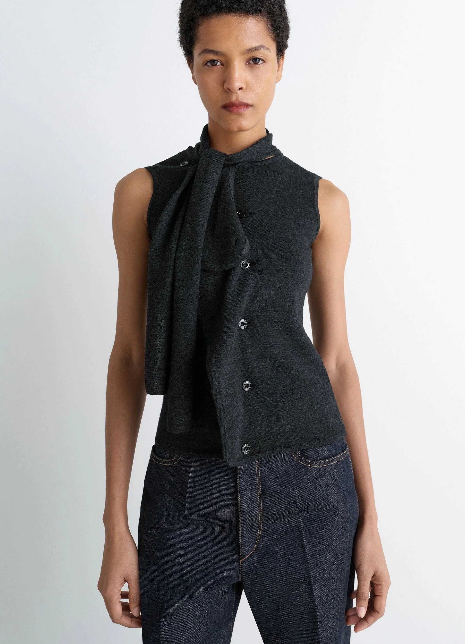 ASYMMETRICAL SLEEVELESS CARDIGAN IN MERINO BLEND